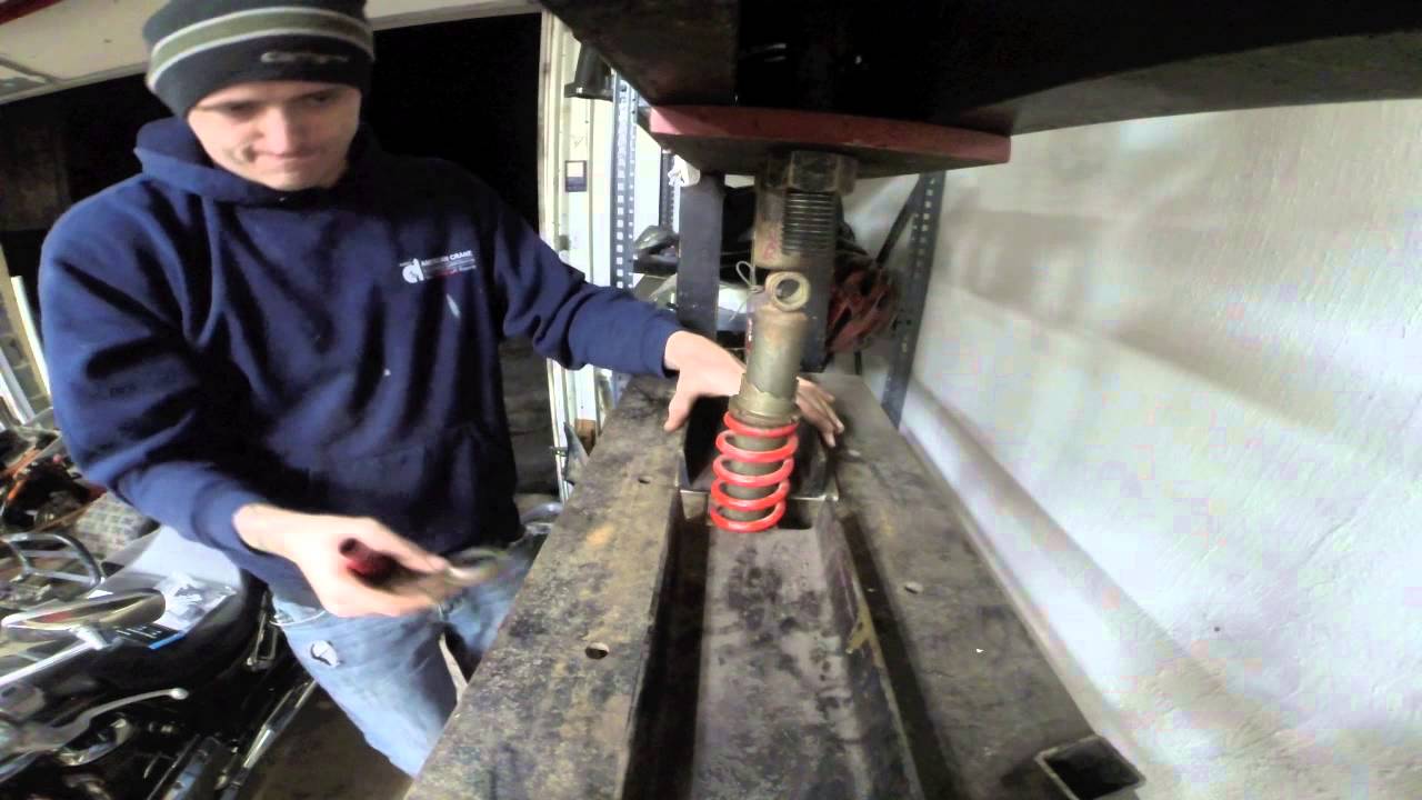How To Remove  Stock ATV Springs From Front Shock Body