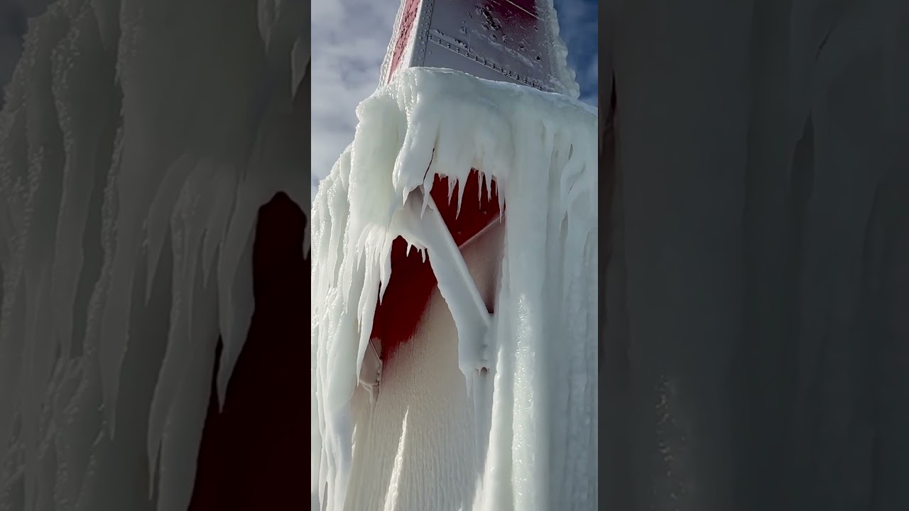 Ice climbs 40 feet up Muskegon breakwater light during arctic blast