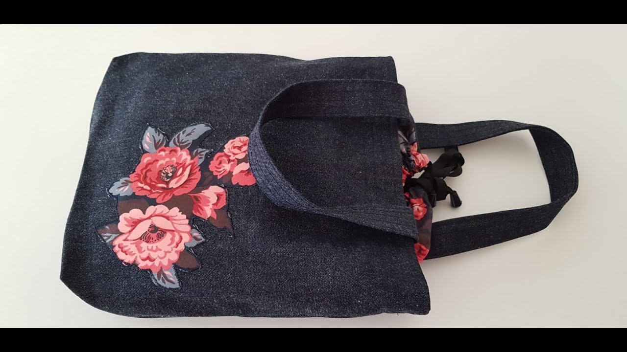 Ağzı Büzgülü Aplikeli Kot Çanta Dikimi