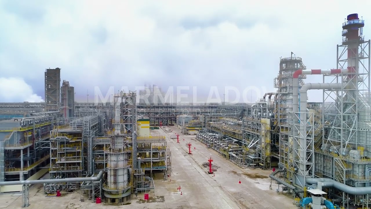 Drone view of petrochemical oil refining complex. Oil and associated gas tanks