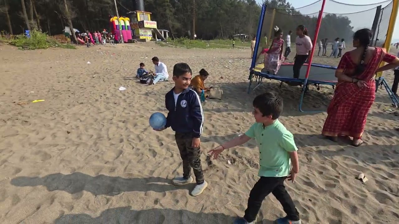 Aditya & Satchit playing football ⚽️ At Nargol Beach near Umbergaon on 1st January 2026
