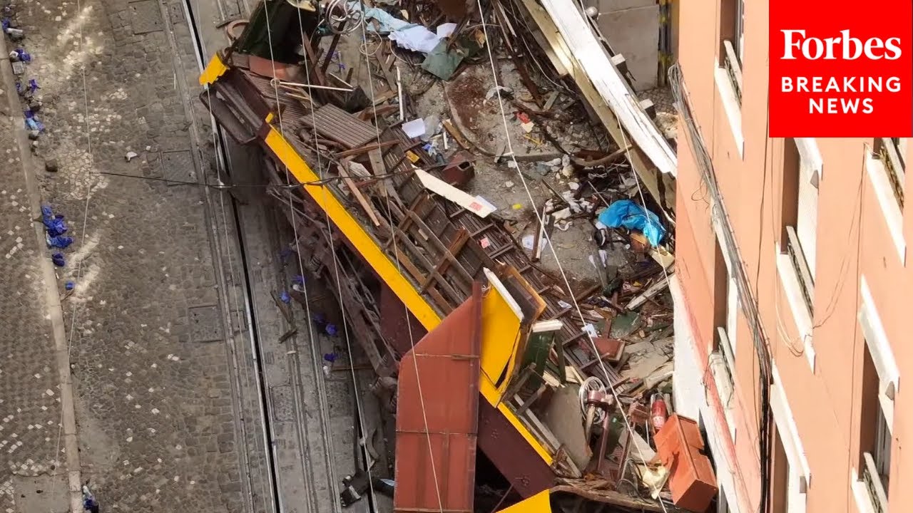 Drone Footage Captures Aftermath Of Deadly Funicular Crash In Lisbon, Portugal