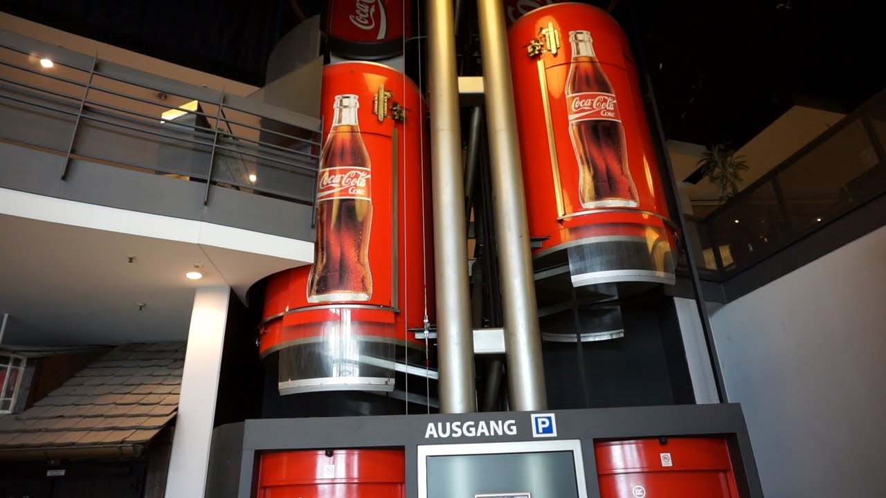 Coca-Cola cylindrical 1995 Schindler roped hydraulic elevators @ CAP, Kiel, Germany