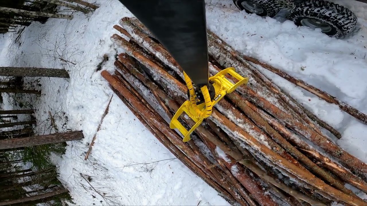 Forest work-Can-Am 650 XTP works hard in the snow. Metsätöis mönkijällä