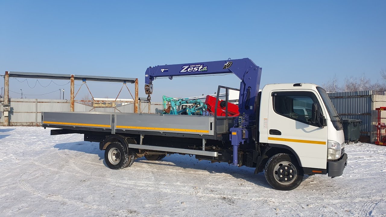 Mitsubishi Fuso 2016 с кму Тадано ZFX 304.кузов 6.1 метр.стрела 10 метров.С НДС. цена 4 560 000 р.