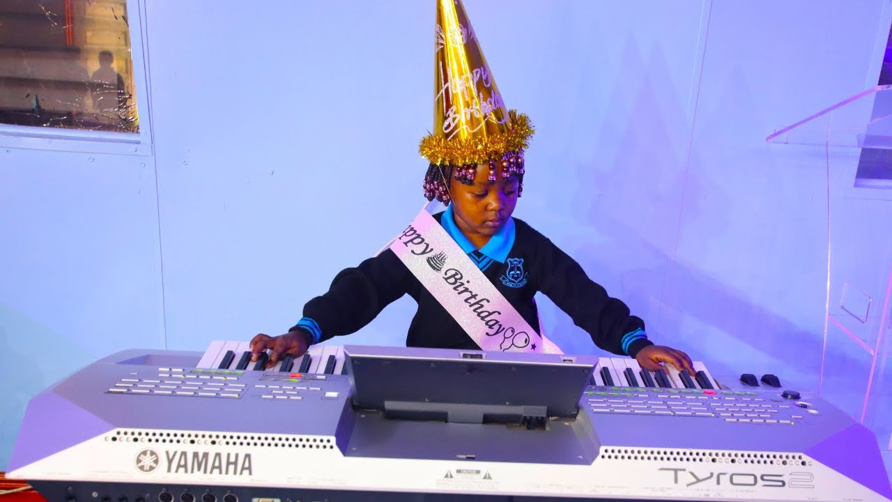 TWC KID CELEBRATES BIRTHDAY ON A KEYBOARD
