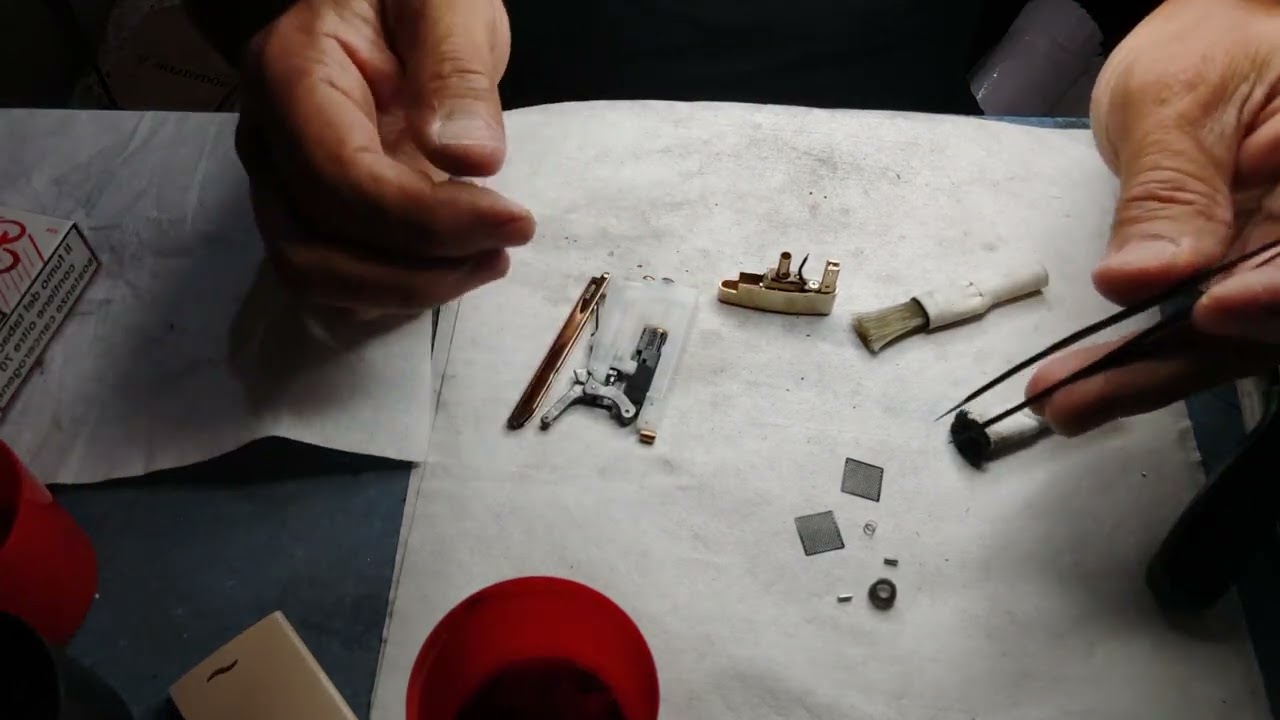 Dupont slim 7 Lighter burner cleaning and piezoelectric adjustment. Mail santoanastasio1@gmail.com