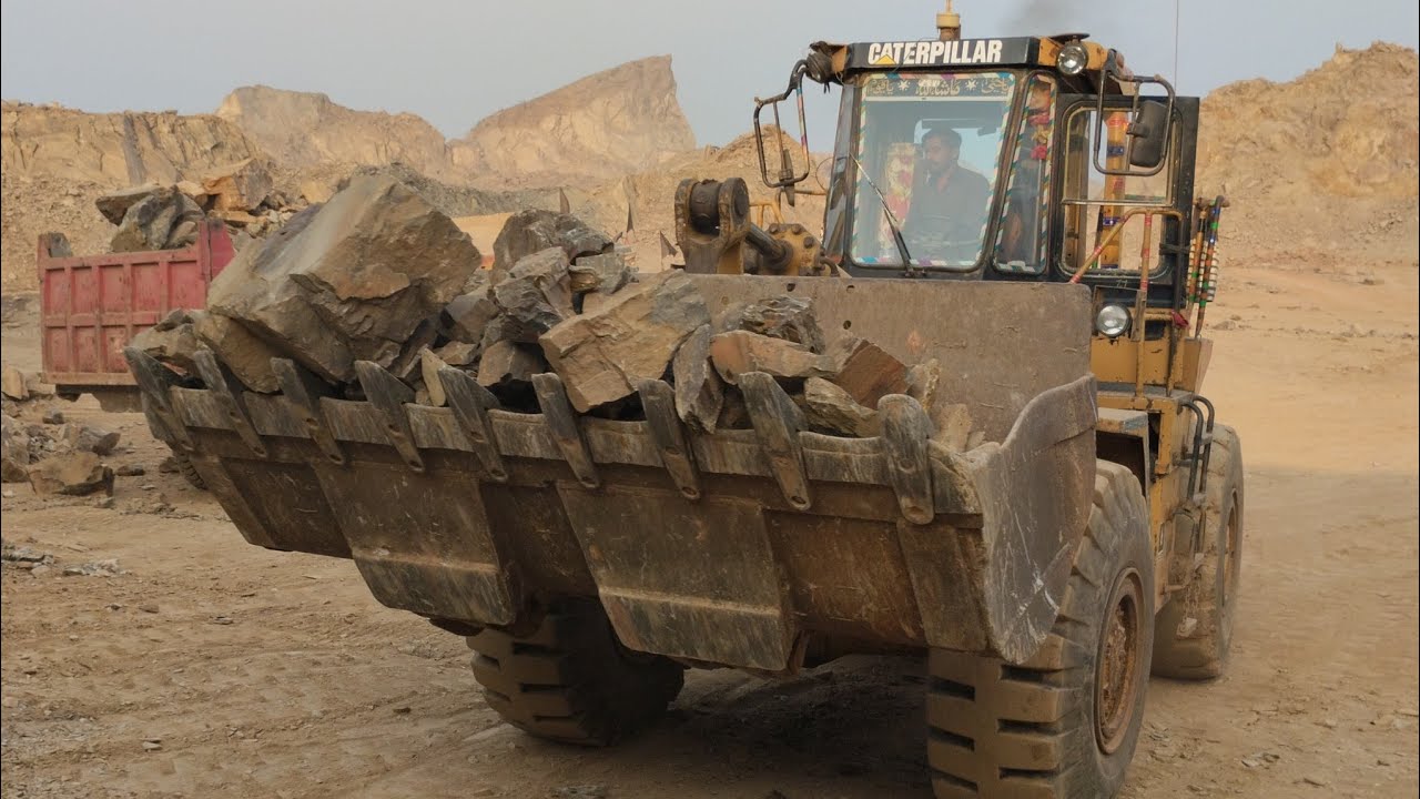 Mega Stone Loading Show: Caterpillar 966D Loading Big Rocks into Huge Trolleys