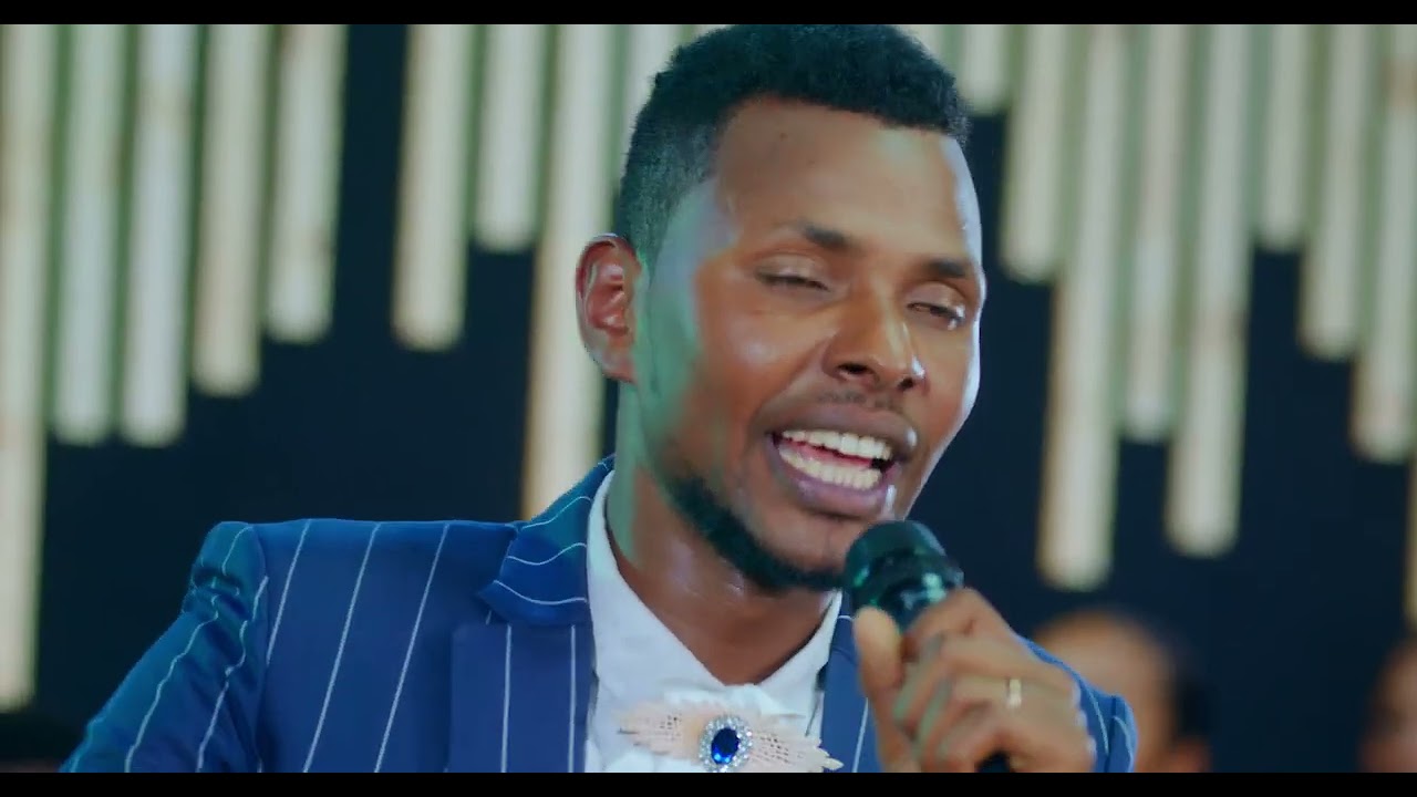 GALATATTI ISAA MALE New Oromo Gospel Song Farf. ROOBEE JAARSOO kunooti ittiin Eebbifamaa