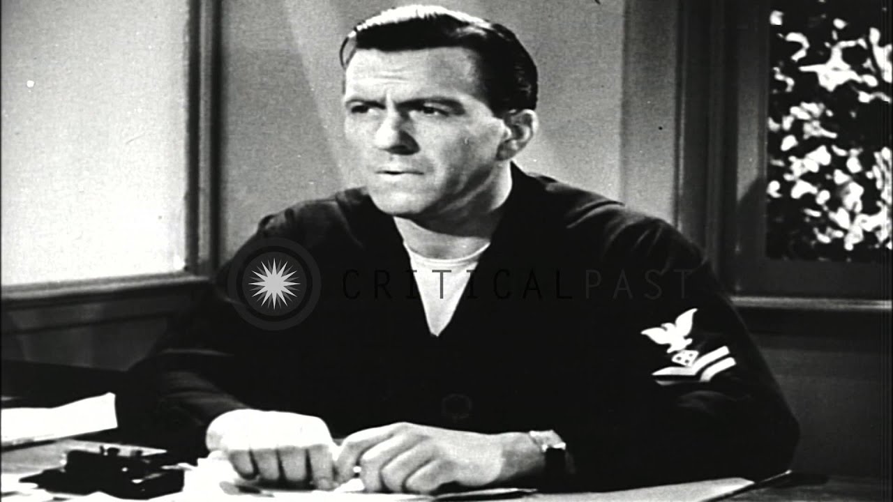 Robert Benchley shares his navy experiences with an expert in the United States. HD Stock Footage