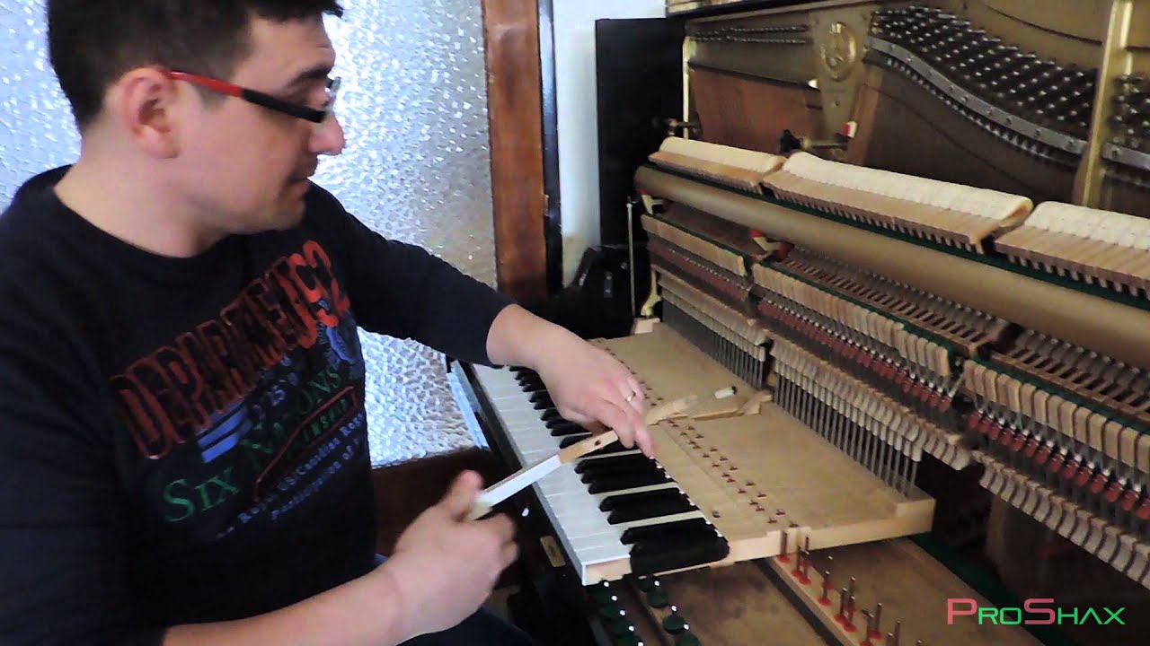 Afinado y Limpieza de piano acustico