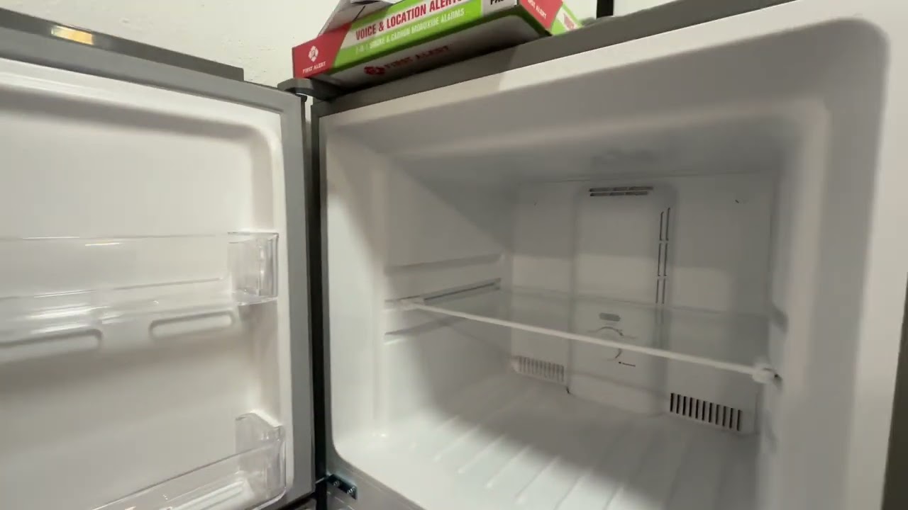 20250124 insignia mid size fridge door swing open swap tip overall not easy