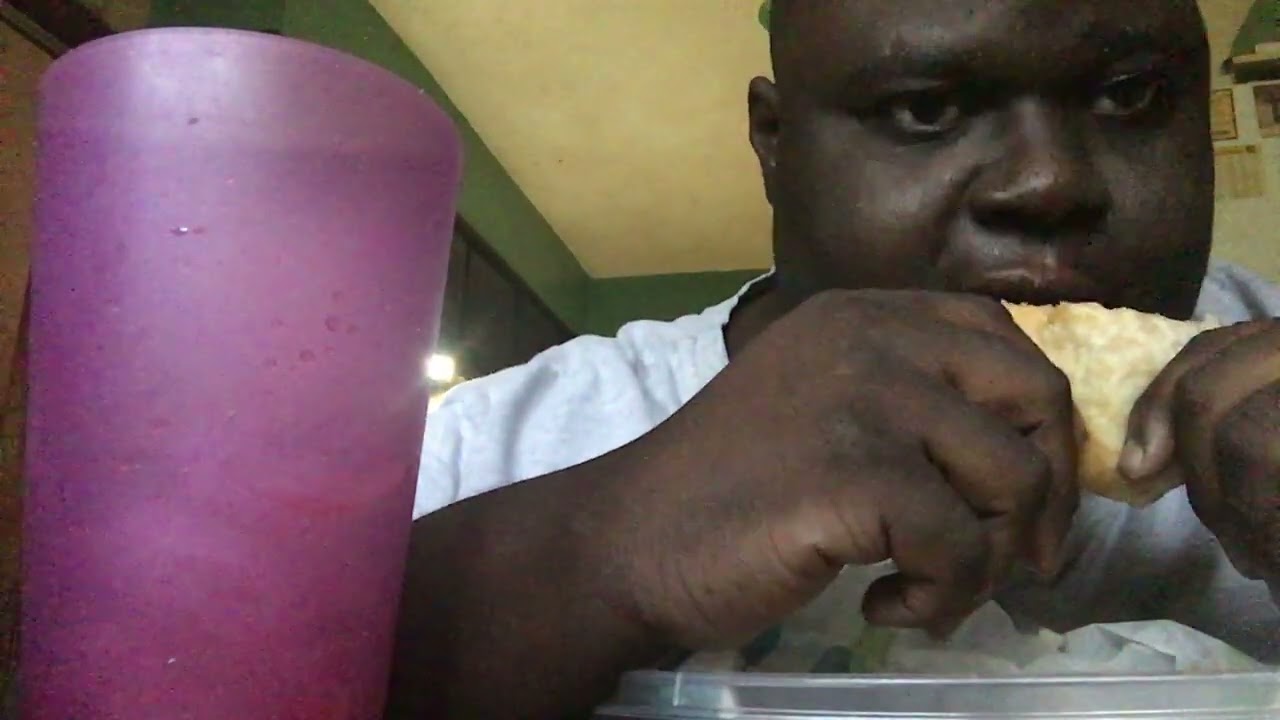 Taco Bell 5 layer burrito and a drink