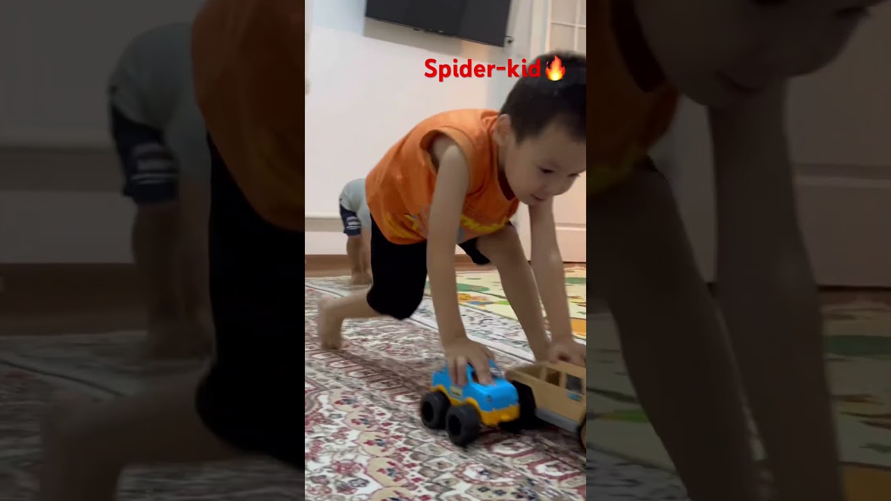 Spider-kid play in toy cars