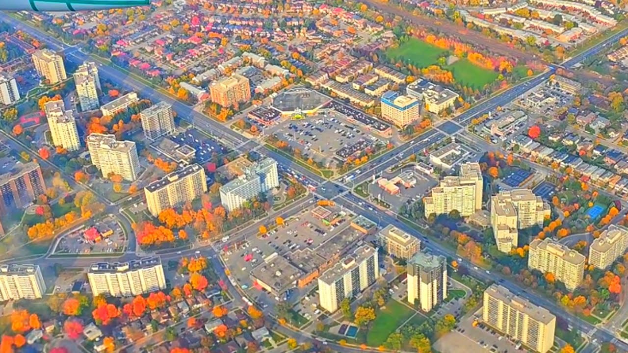 SKY VIEW FROM AIRPLANE LANDING IN TORONTO CITY