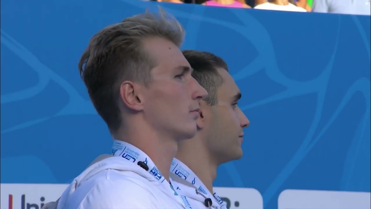 Kristof Milak sharing podium with his friend Marton Richard in 200fly ceremony
