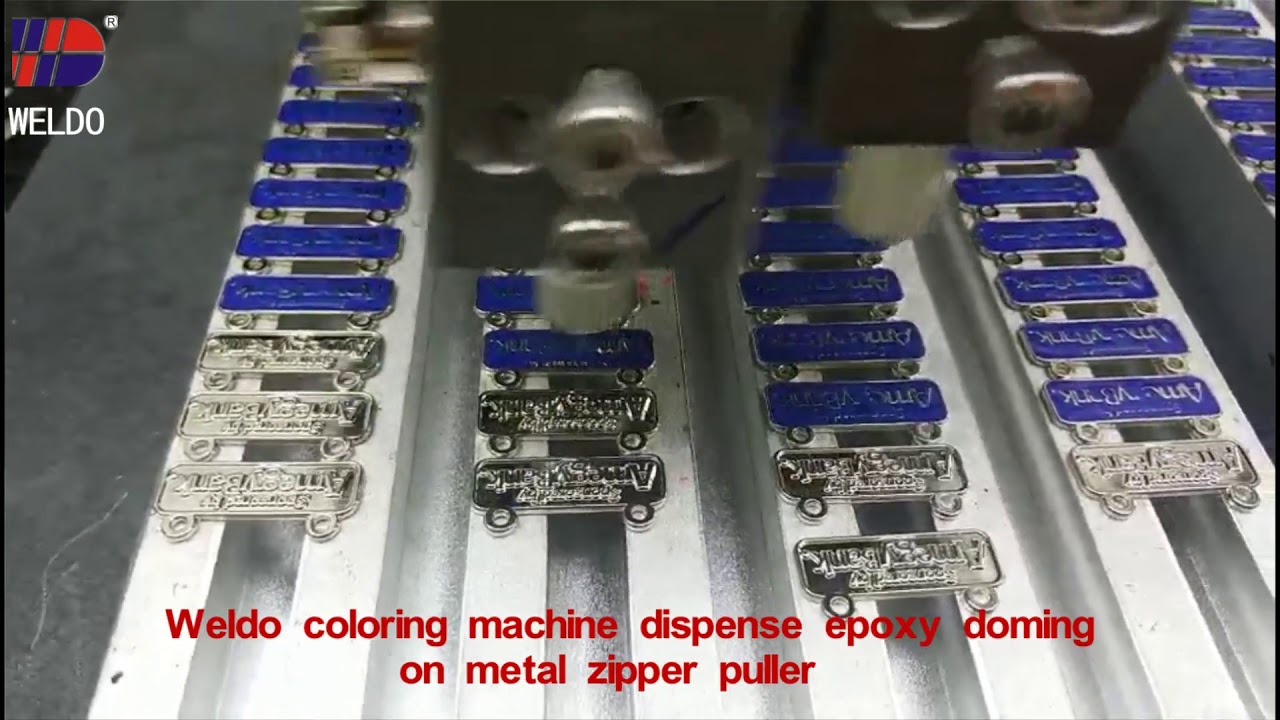 Weldo machine make epoxy doming zipper puller Weldo Video 68
