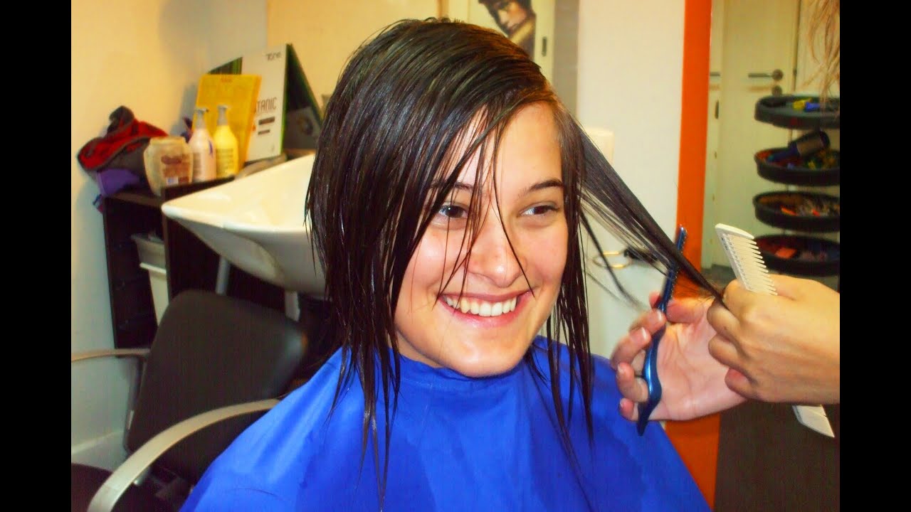 The new surprise shorter haircut of a beautiful young student