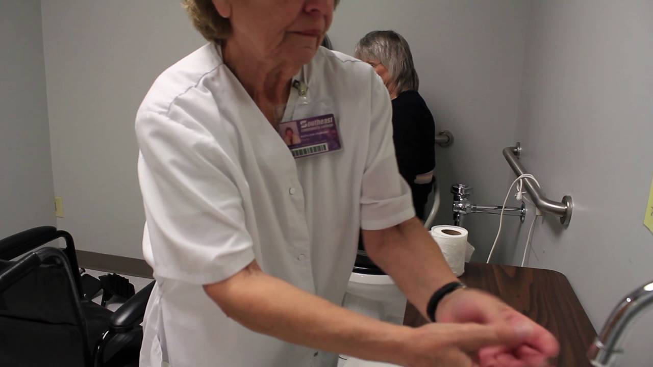 Transferring a resident from wheelchair to toilet