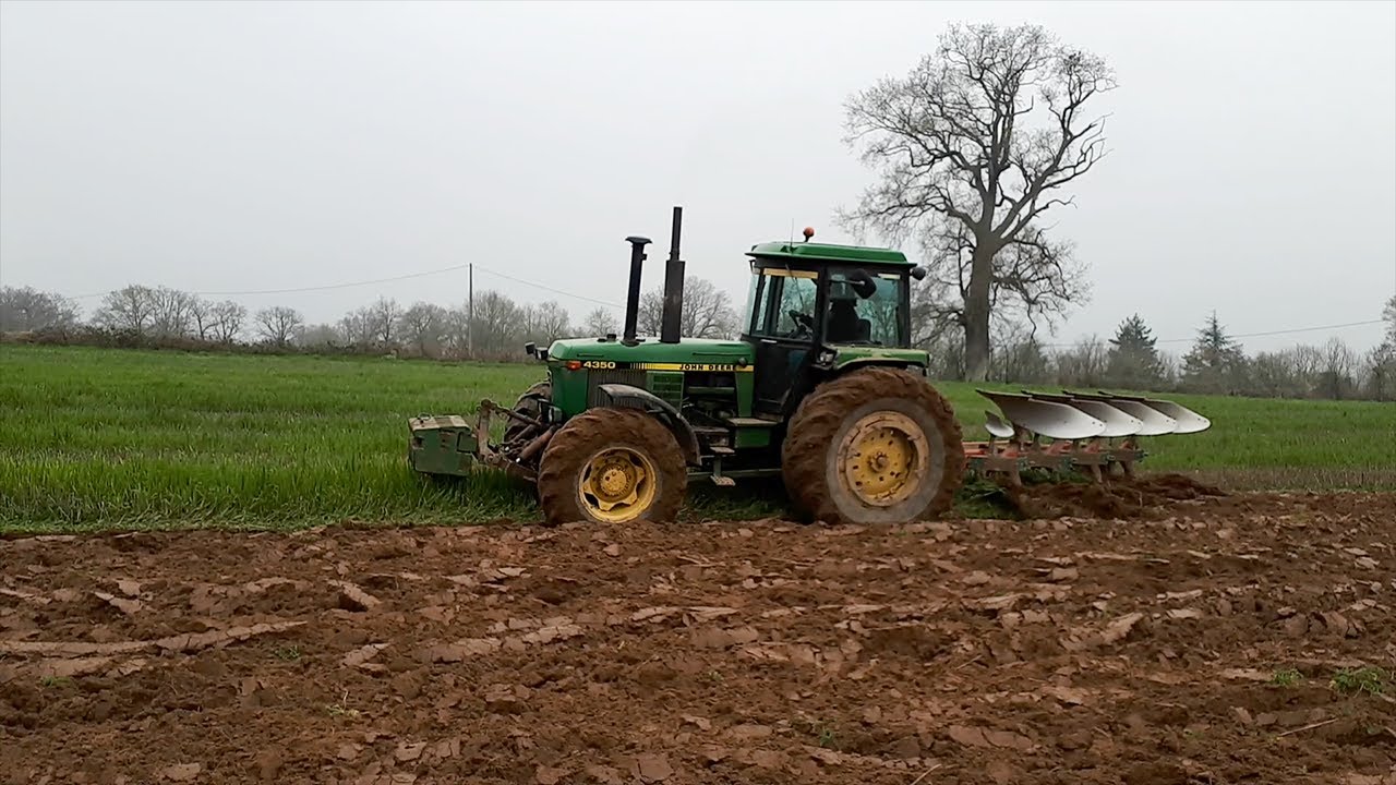 John Deere 4350 - Ploughing