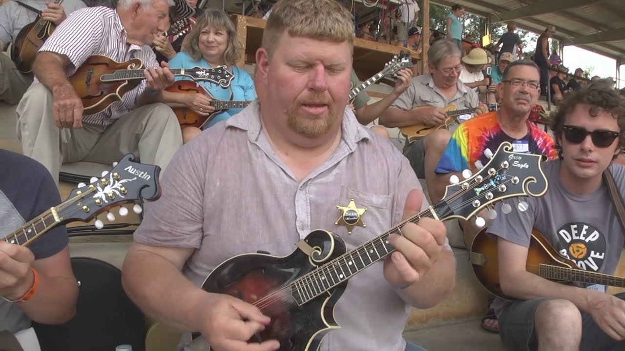Breaking the world record for the largest group of performing mandolin players.