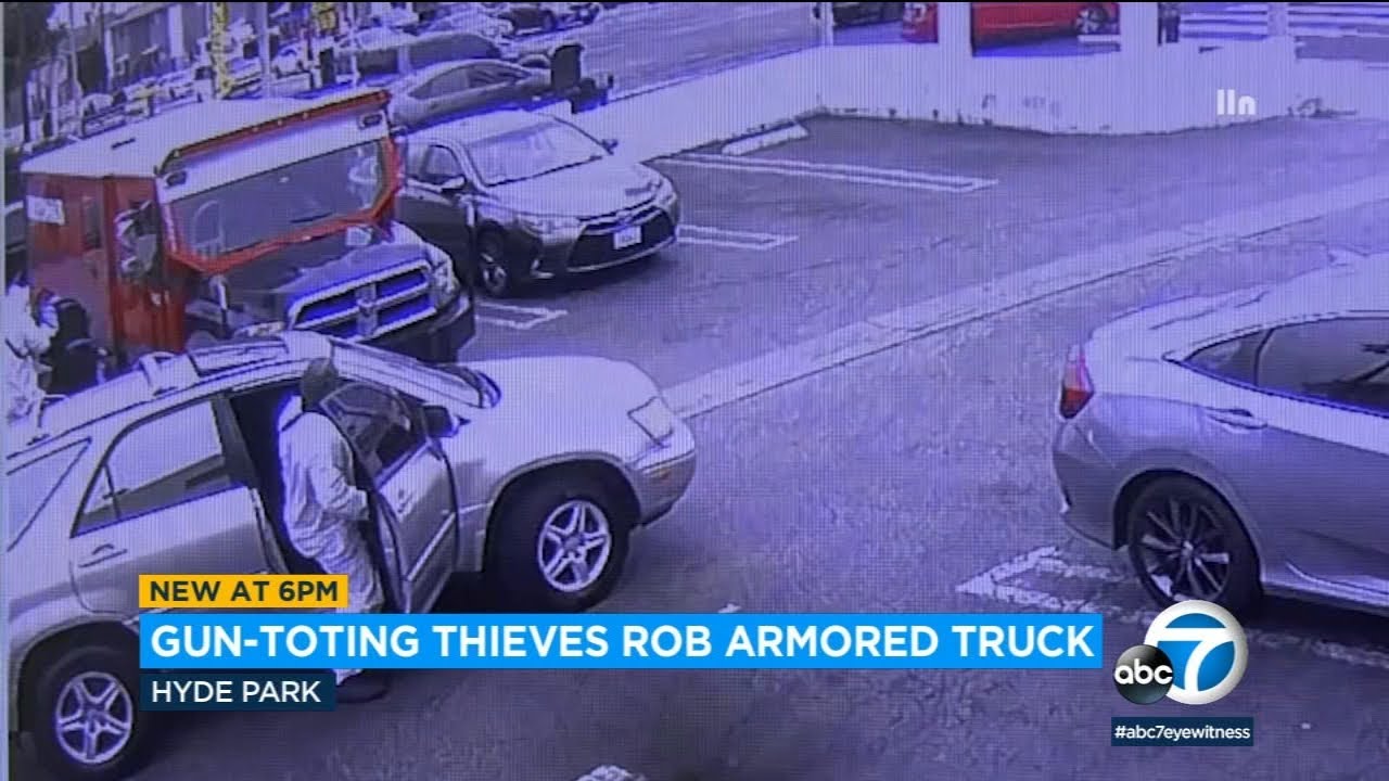 Rifle-toting thieves rob armored truck in broad daylight