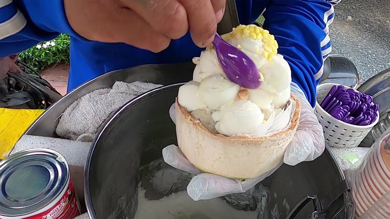Thai coconut ice cream serviced by Mr.motorcycle ice cream thailand street food