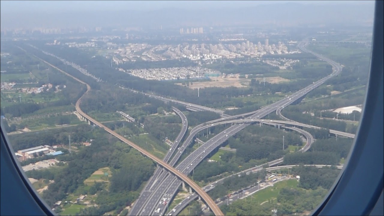 Amazing aerial views of Beijing: approach and landing at PEK Capital International Airport
