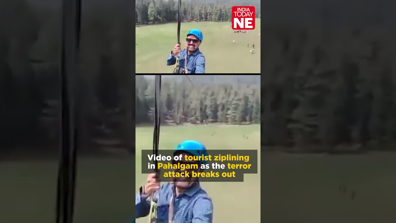 A horrifying video has surfaced showing a man on a zip line as terrorists open fire