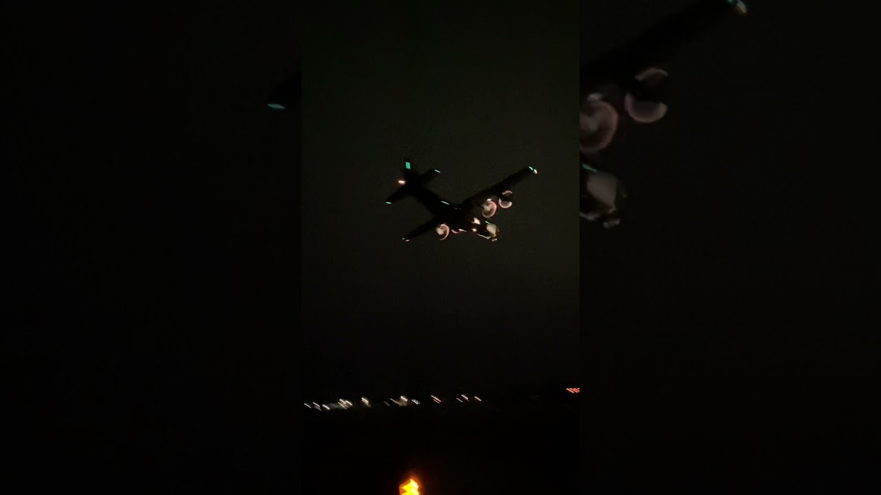 C-130 Hercules Landing at Night at Air Force Base