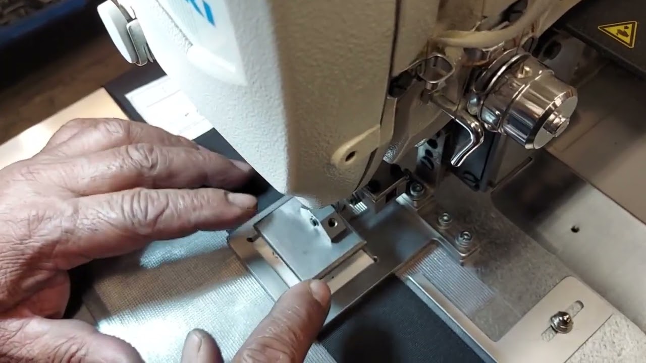 Juki AMS210EN with 360 device sewing label