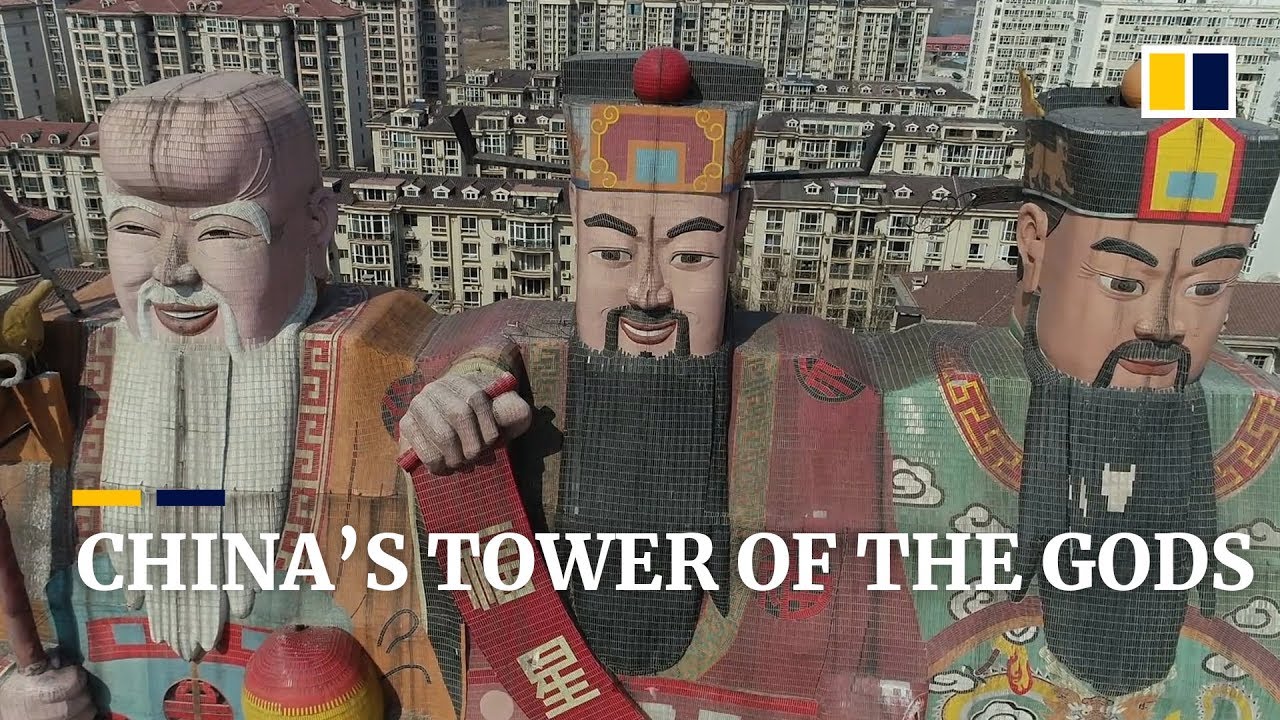 Giant gods stand guard over Chinese building in Beijing suburb