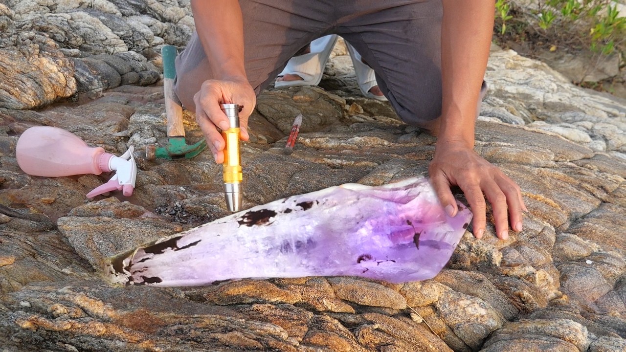 A rare type of agate. Amethyst hidden inside the stone.
