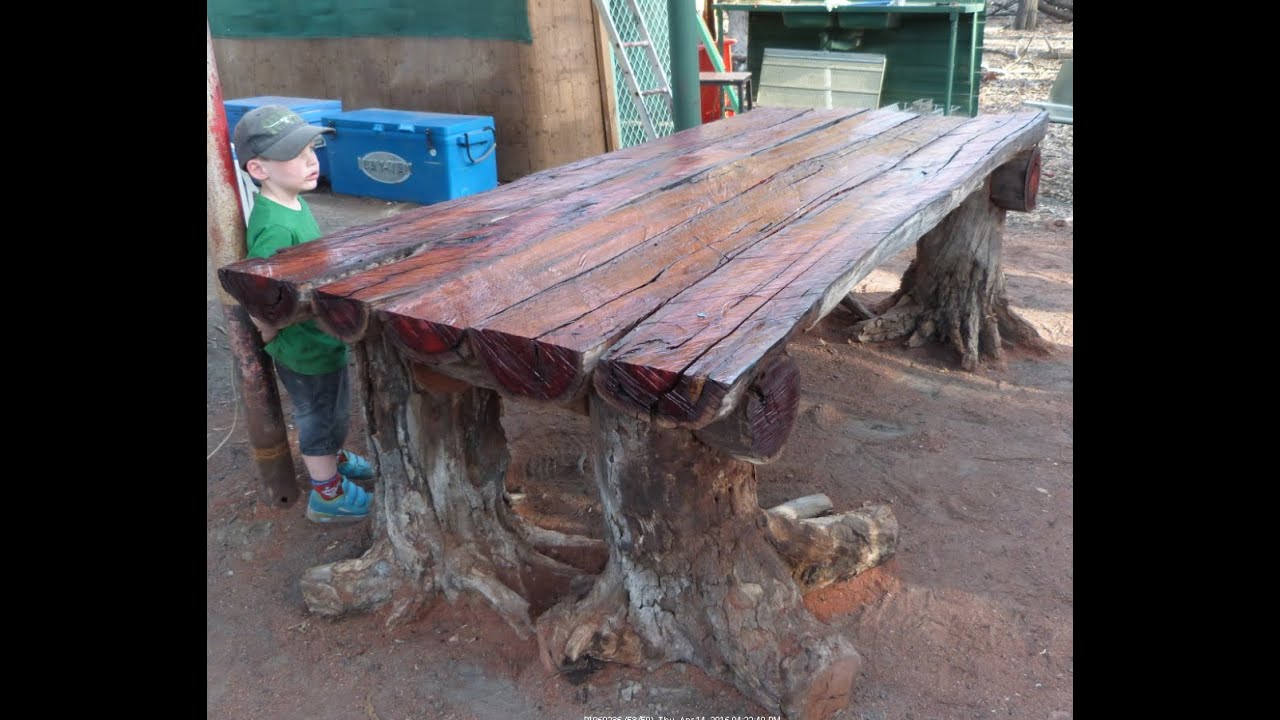 With a Chainsaw I Make a Rustic Log Furniture Table, using Tree Stumps for the Table Legs.
