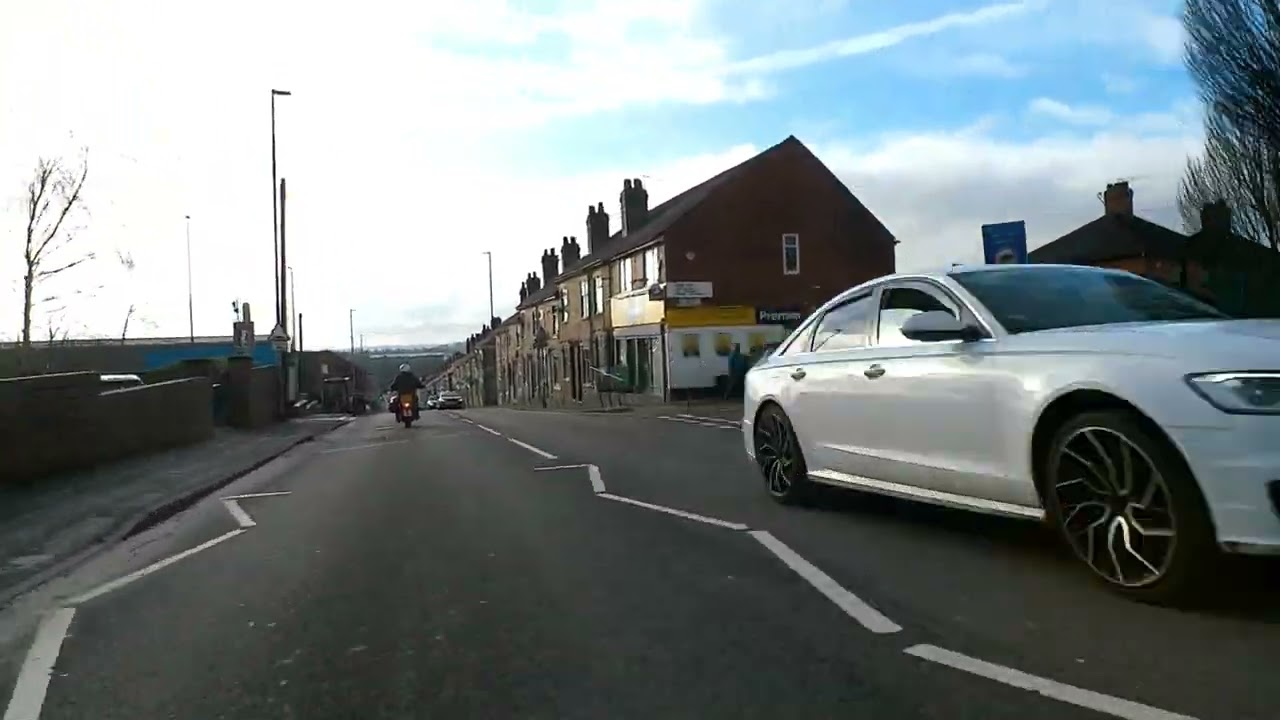 Cycling down Anchor Road, 1pm, January 2026