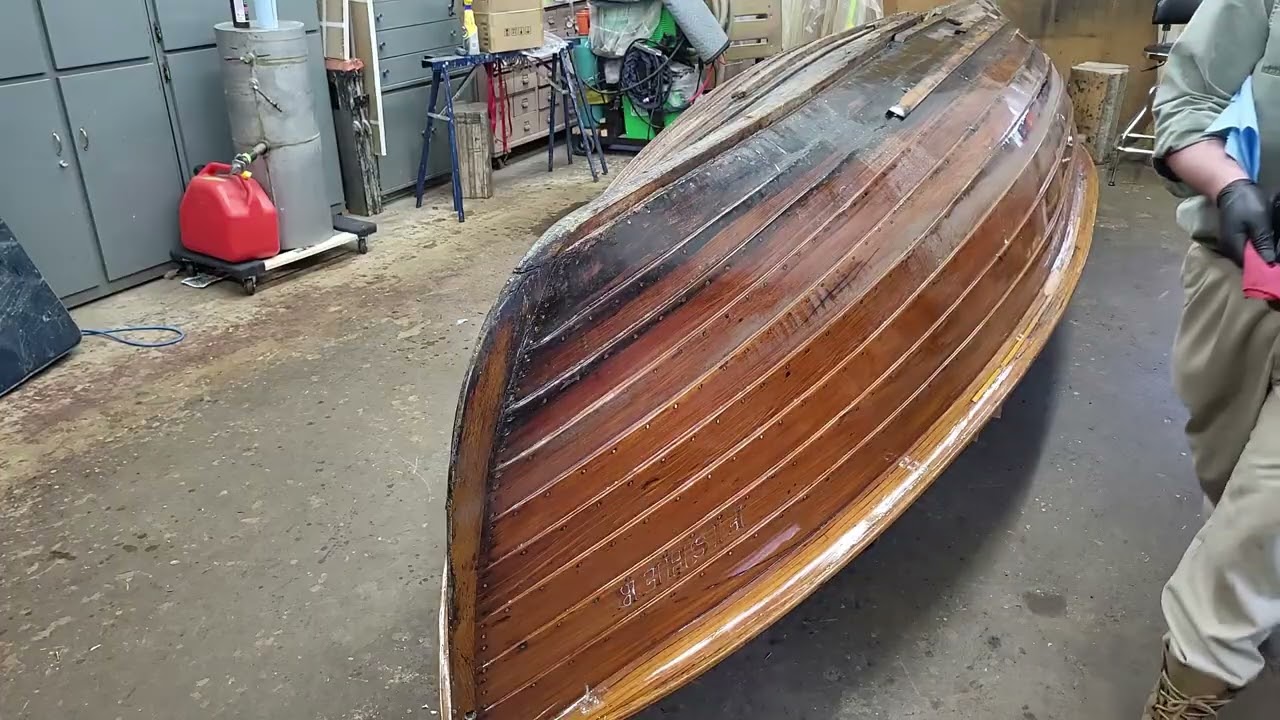 Fisher 3 varnishing the outside of the hull