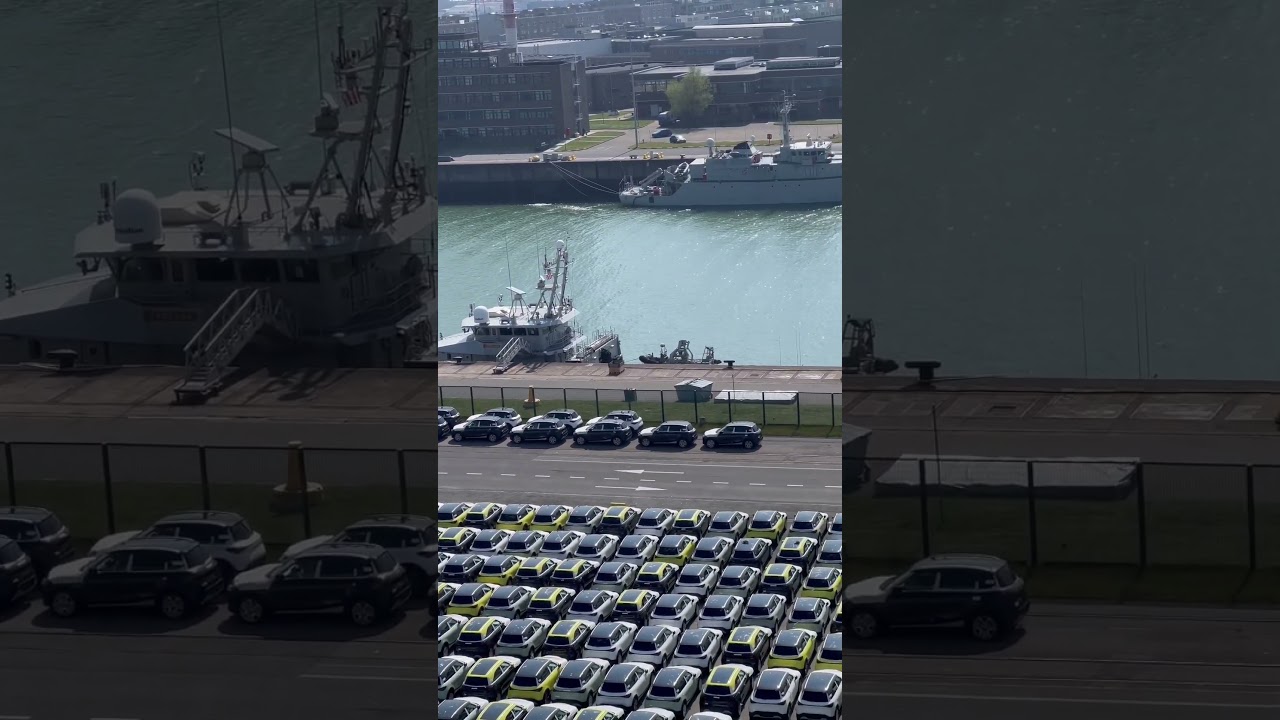 Huge amount of brand new cars parked at port of Zeebrugge, Bruge Belgium waiting to be shipped