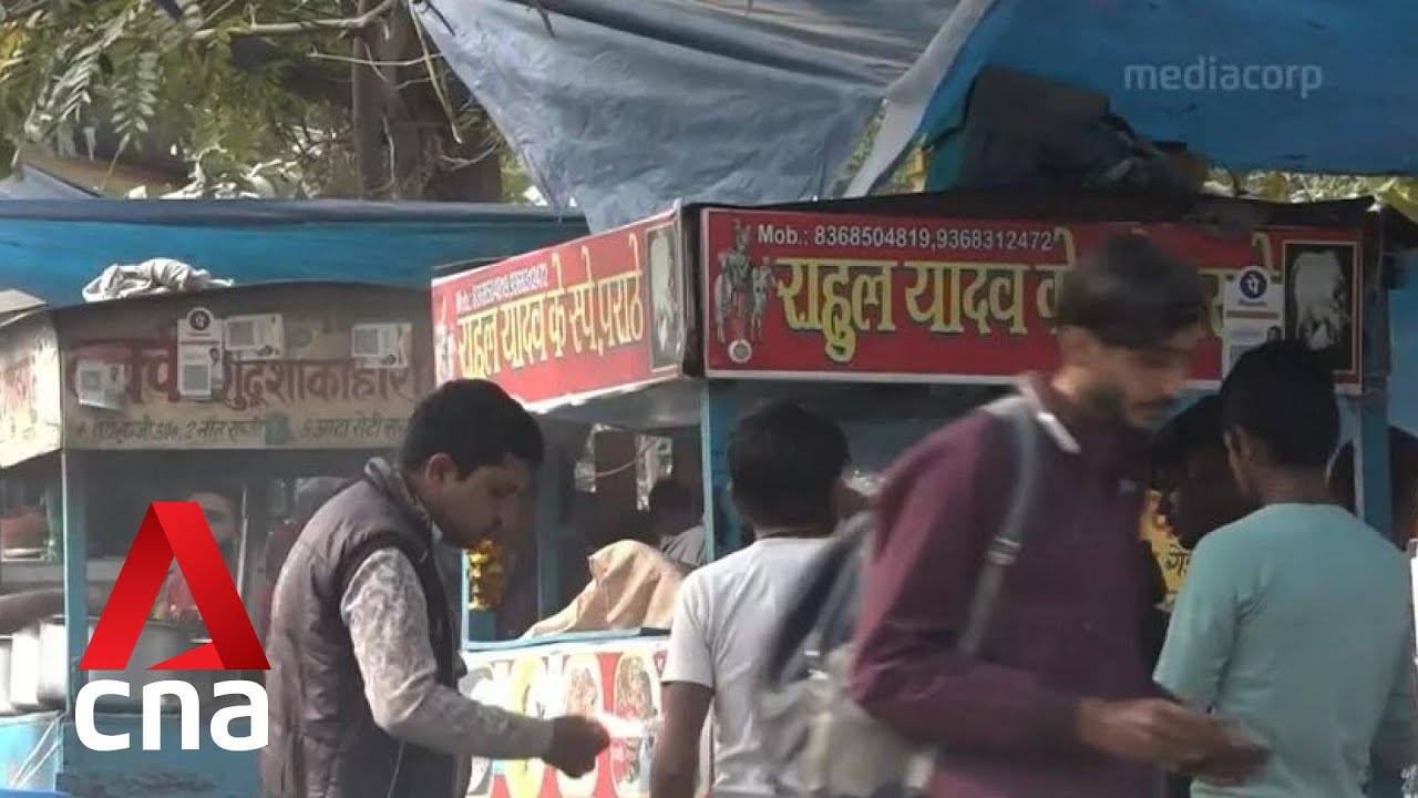 New Delhi lifts all COVID-19 curbs as cases dip