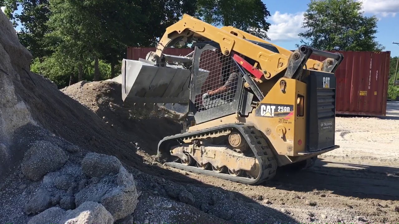 Operating a CAT 259d skid steer