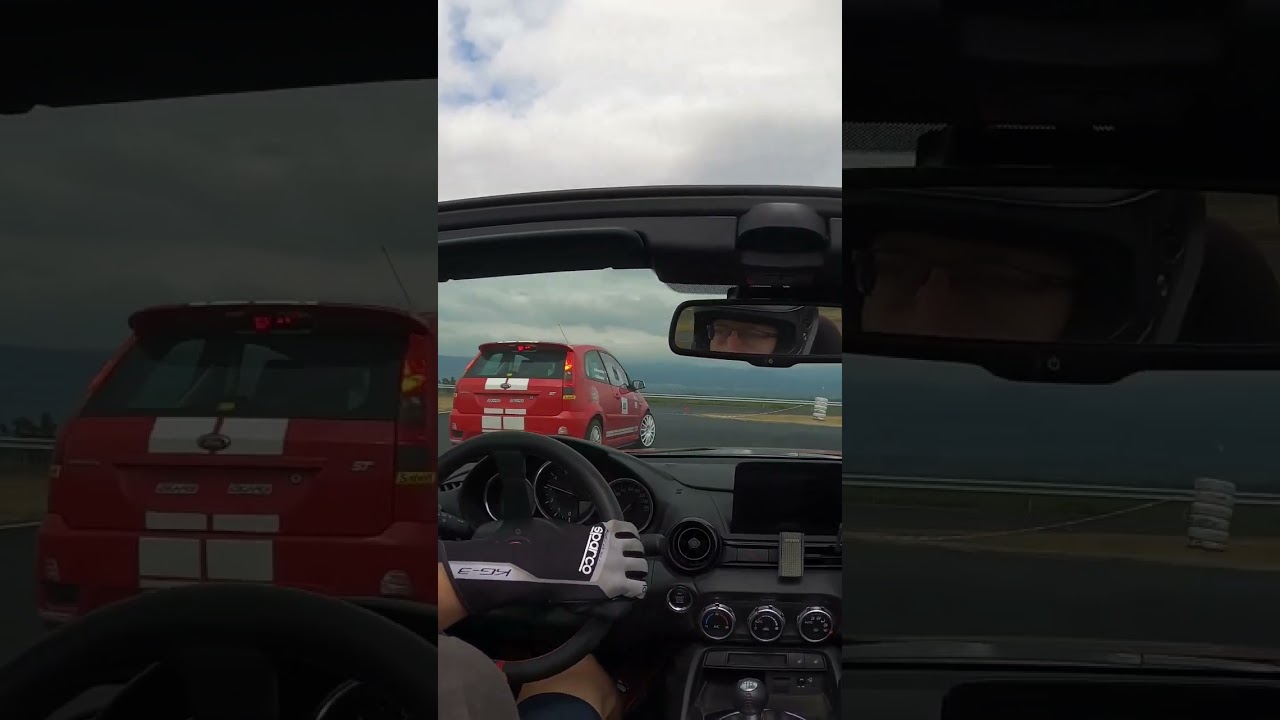 Fiesta understeers and MX-5 oversteers on a wet track
