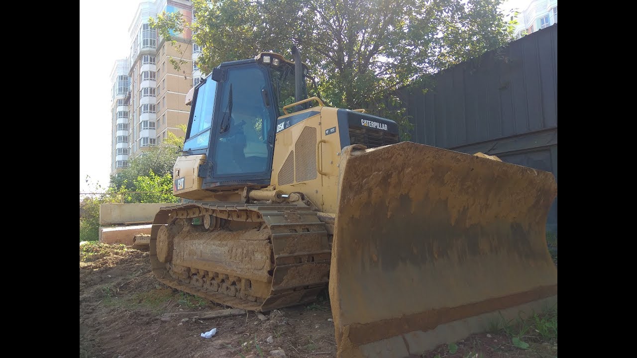Как управлять бульдозером CATERPILLAR D5 - органы управления.