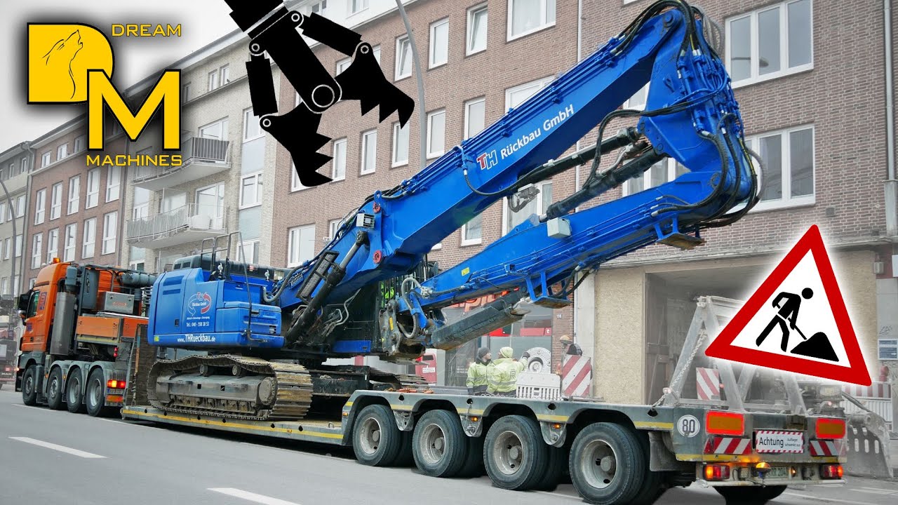 Passt der DA durch? CATERPILLAR LONGFRONT BAGGER FÄHRT IN GEBÄUDE SCHWERTRANSPORT ABBRUCH BAUSTELLE