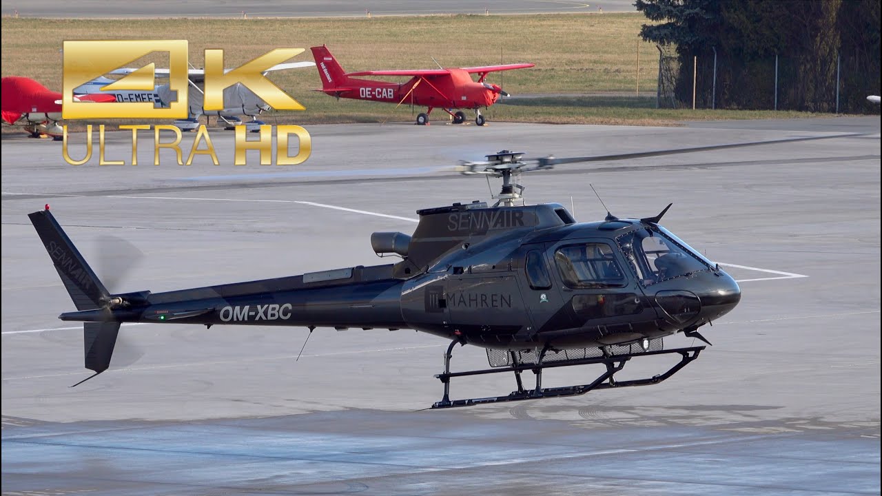 (4K) Eurocopter AS-350 Ecureuil SennAir OM-XBC departure at Innsbruck Airport LOWI INN