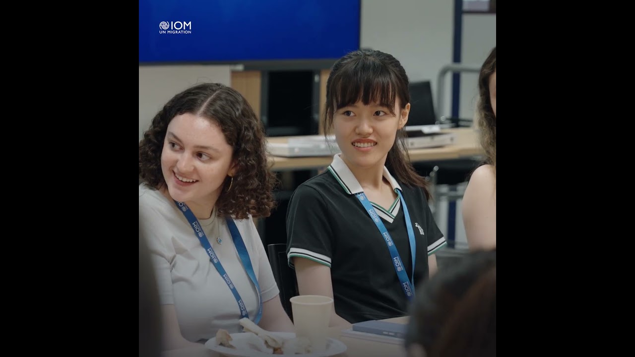 IOM DG Amy Pope with IOM Interns
