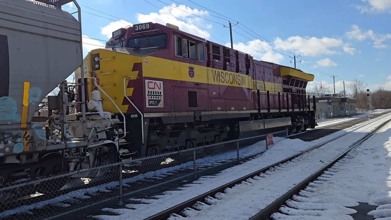 CN G874 eastbound with the Wisconsin Central heritage and horn salute 2026-02-14