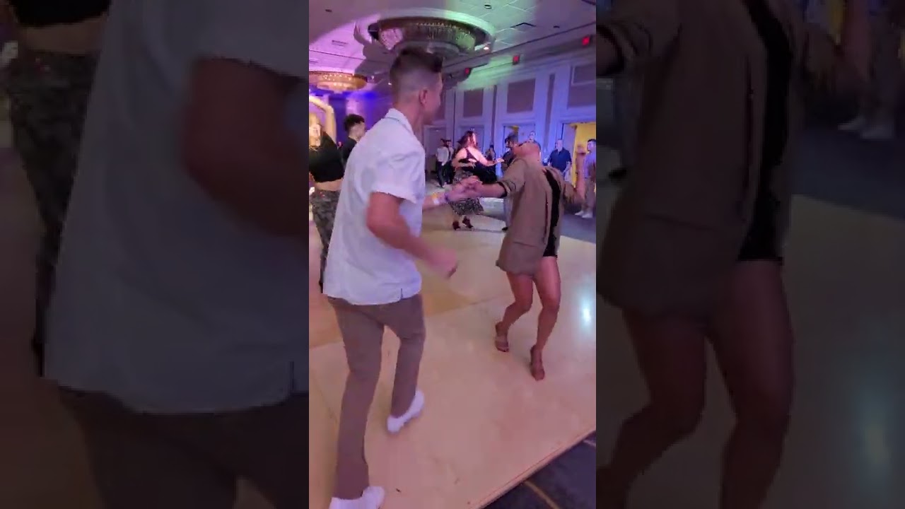 Stephany Moore and David stein social dancing at BIG Salsa festival Houston #majestic #Stephany
