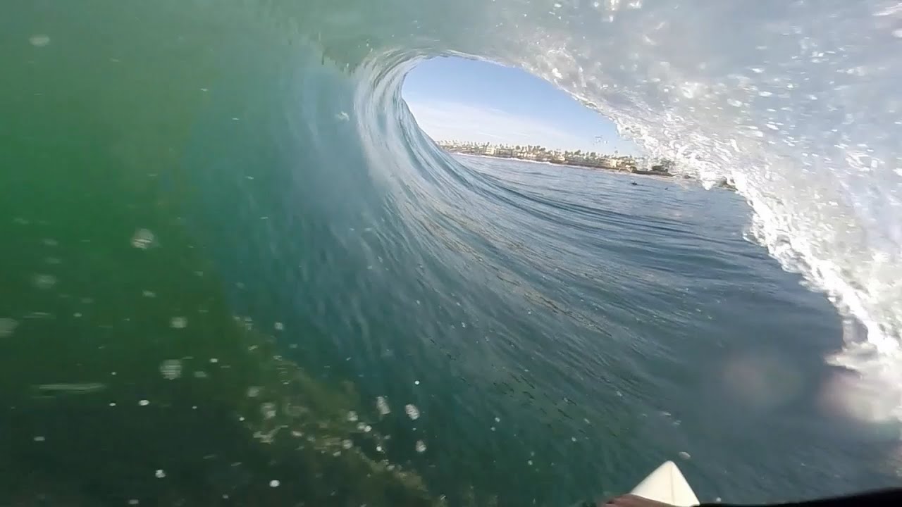Surfing a few tubes in San Diego