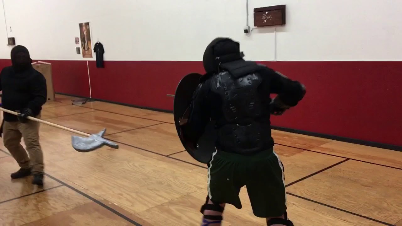 Halberd vs sword and shield