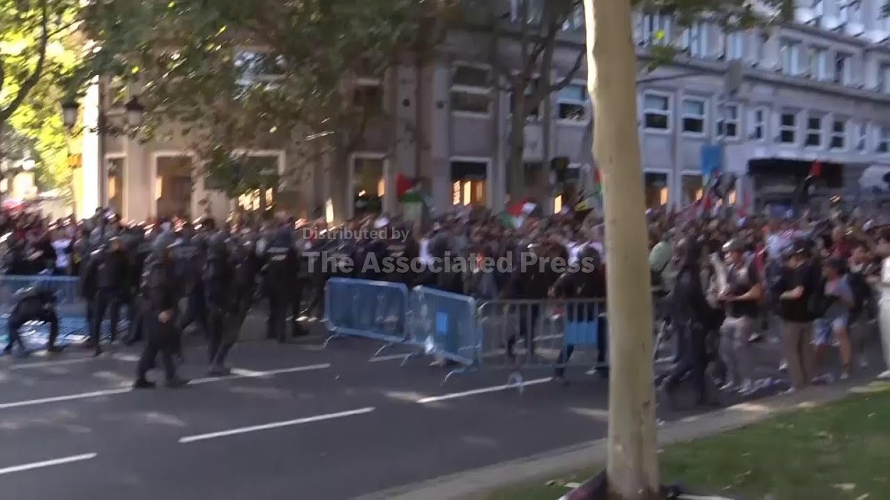Final stage of Spanish Vuelta cycling race interrupted by pro-Palestinian protesters