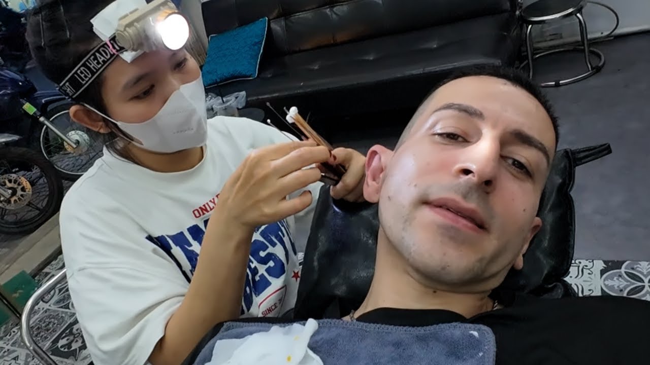 Ear wax cleaning in Vietnam by a Vietnamese angel (and Face shave?)